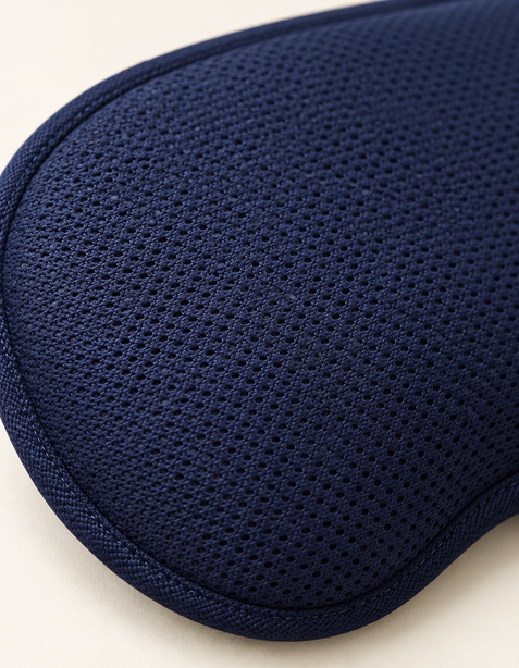 Close-up of the dark blue eye mask fabric